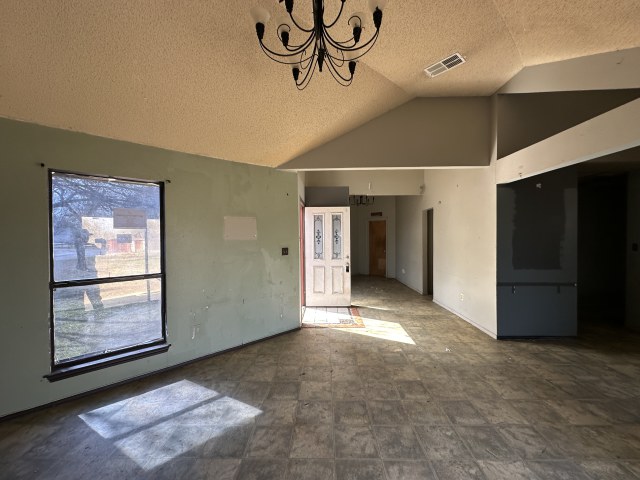 548 Spring River Drive Martindale, TX 78655 - Photo 6 of 17 Unfurnished dining area featuring a chandelier and baseboards
