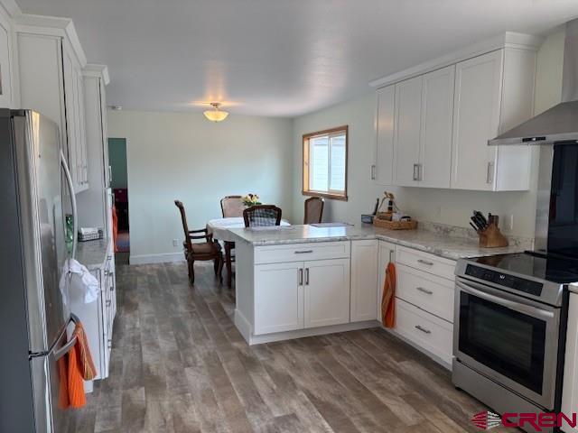 15736 2600th Road Cedaredge, CO 81413 - Photo 13 of 42 a kitchen with a sink appliances and cabinets