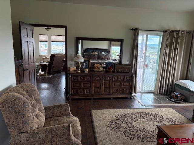 15736 2600th Road Cedaredge, CO 81413 - Photo 23 of 42 a living room with furniture and a large window