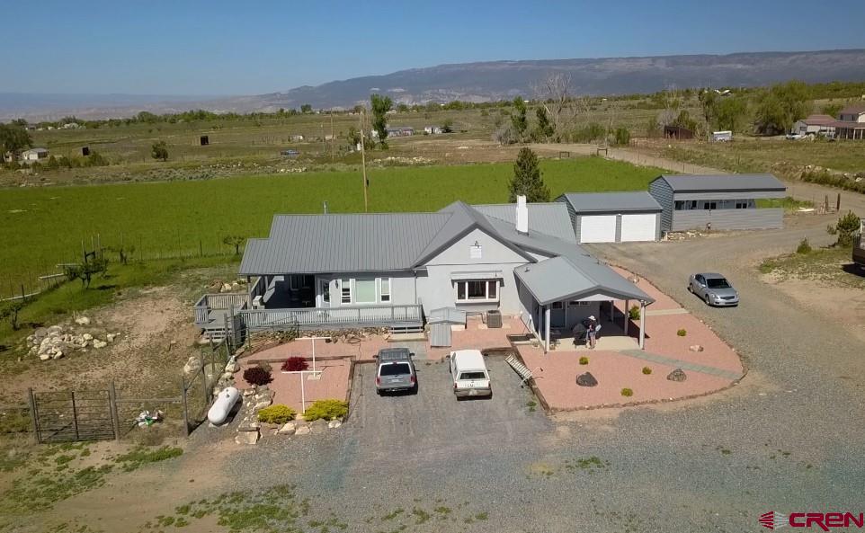 15736 2600th Road Cedaredge, CO 81413 - Photo 3 of 42 an aerial view of a house with outdoor space