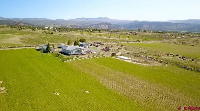a view of an ocean and a mountain