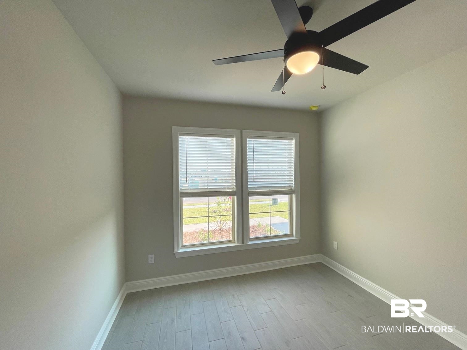 1634 Fenton Circle Foley, AL 36535 - Photo 9 of 14 Empty room featuring ceiling fan and light wood-type flooring