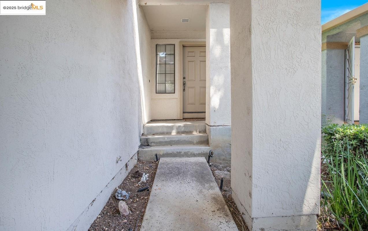 720 Timberline Terrace Brentwood, CA 94513 - Photo 8 of 12 a view of a entryway door of the house