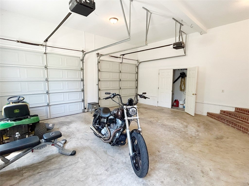 2004 Moores Mill Road Lanett, AL 36863 - Photo 37 of 50 This spacious garage offers ample room and direct access to your living space.
