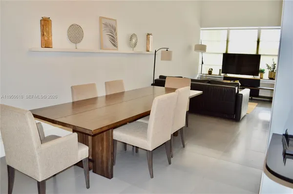 a view of a workspace with furniture