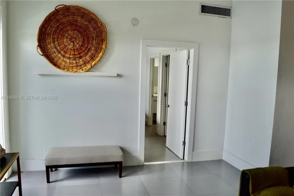 an entryway with a workspace