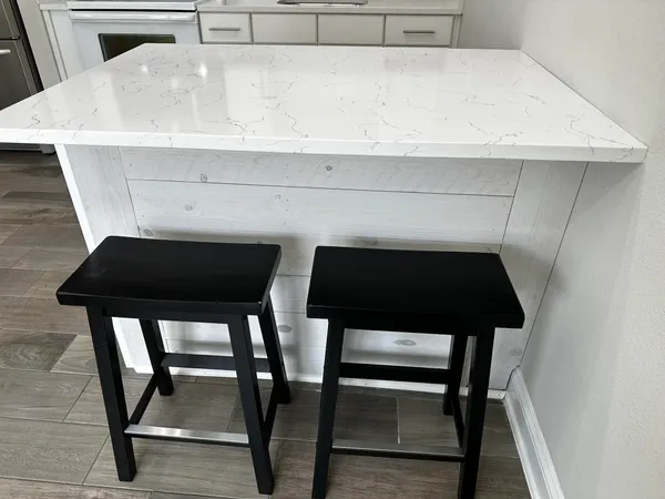 a close view of chairs in kitchen