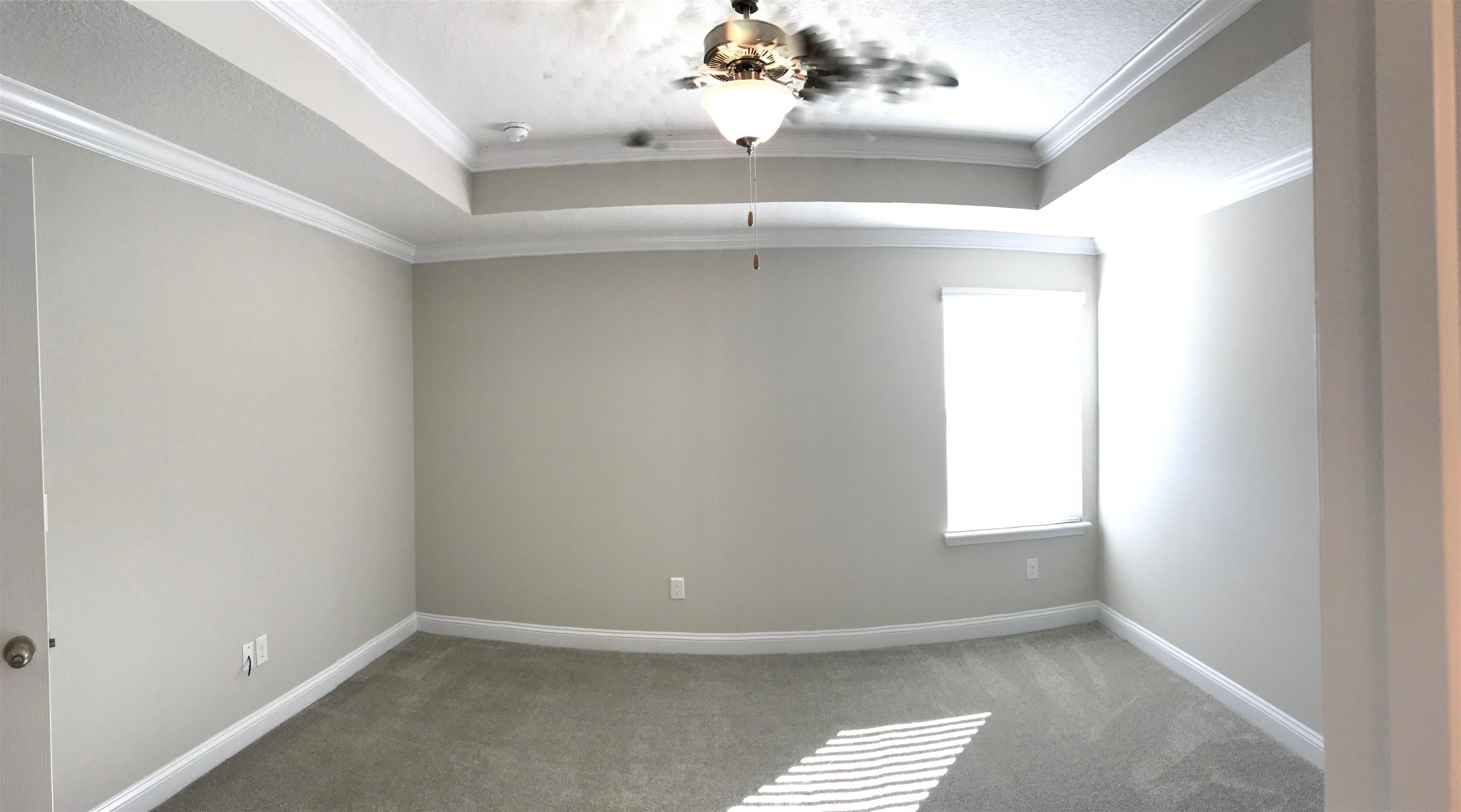 116 Coastal Hammock Way St. Augustine, FL 32086 - Photo 9 of 13 an empty room with a window and chandelier
