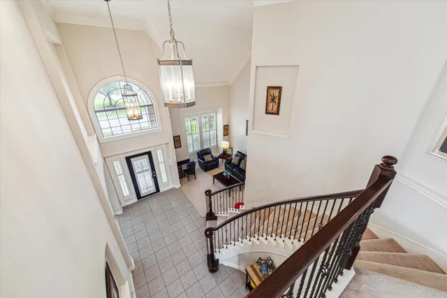 a view of a livingroom with furniture and windows