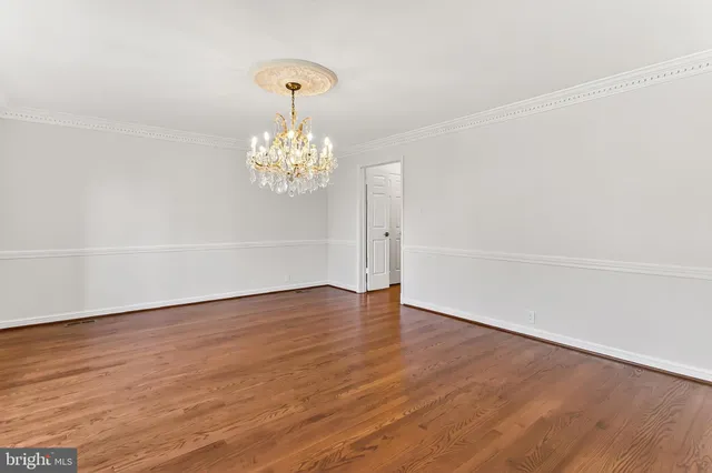 a kitchen with stainless steel appliances a refrigerator stove and microwave