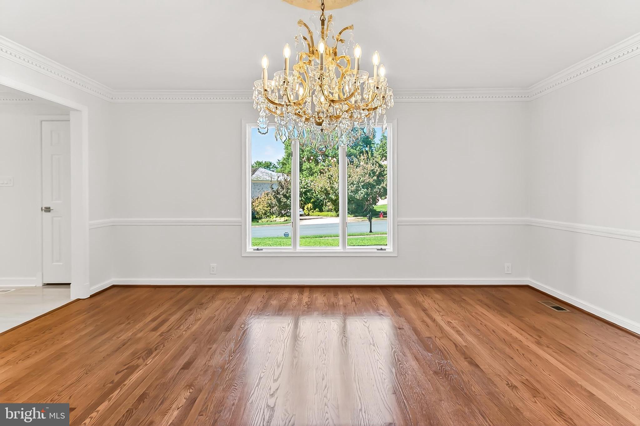 6294 Dunaway Court McLean, VA 22101 - Photo 12 of 76 a view of empty room with wooden floor and fan