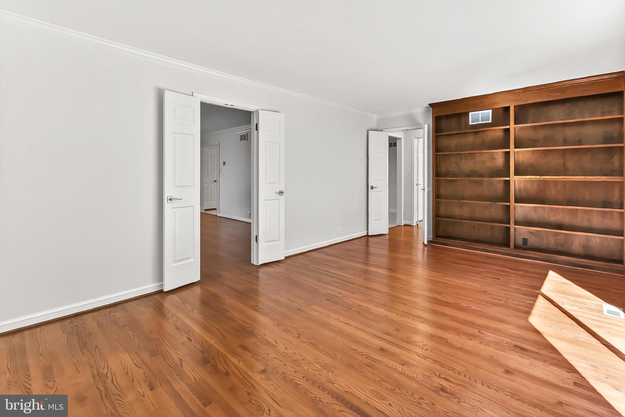 6294 Dunaway Court McLean, VA 22101 - Photo 27 of 76 a view of an empty room with wooden floor and closet