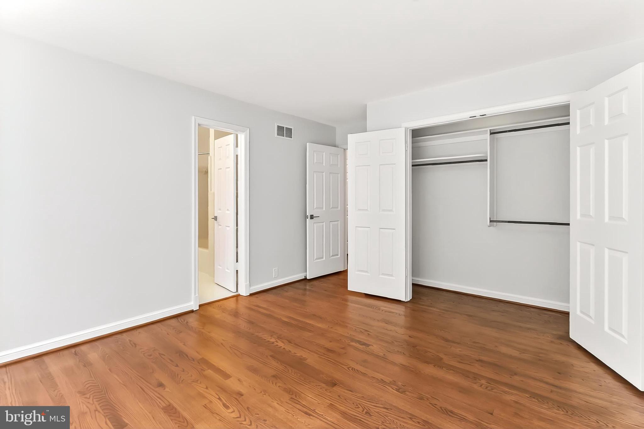 6294 Dunaway Court McLean, VA 22101 - Photo 43 of 76 an empty room with wooden floor & closet area