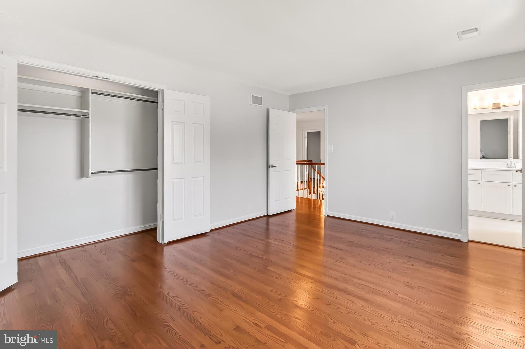 6294 Dunaway Court McLean, VA 22101 - Photo 47 of 76 a view of empty room with wooden floor and window