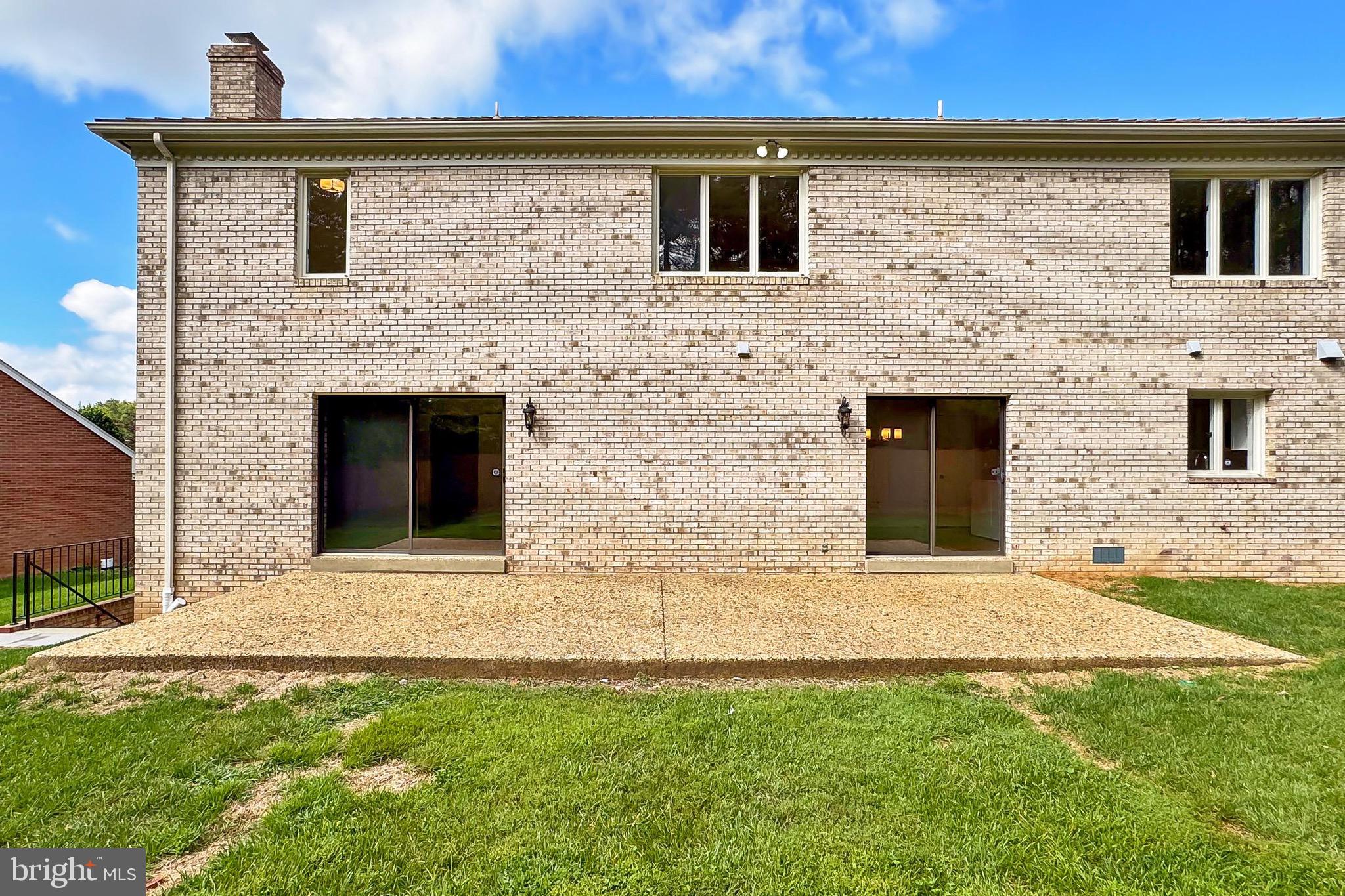 6294 Dunaway Court McLean, VA 22101 - Photo 68 of 76 a front view of a house with a yard