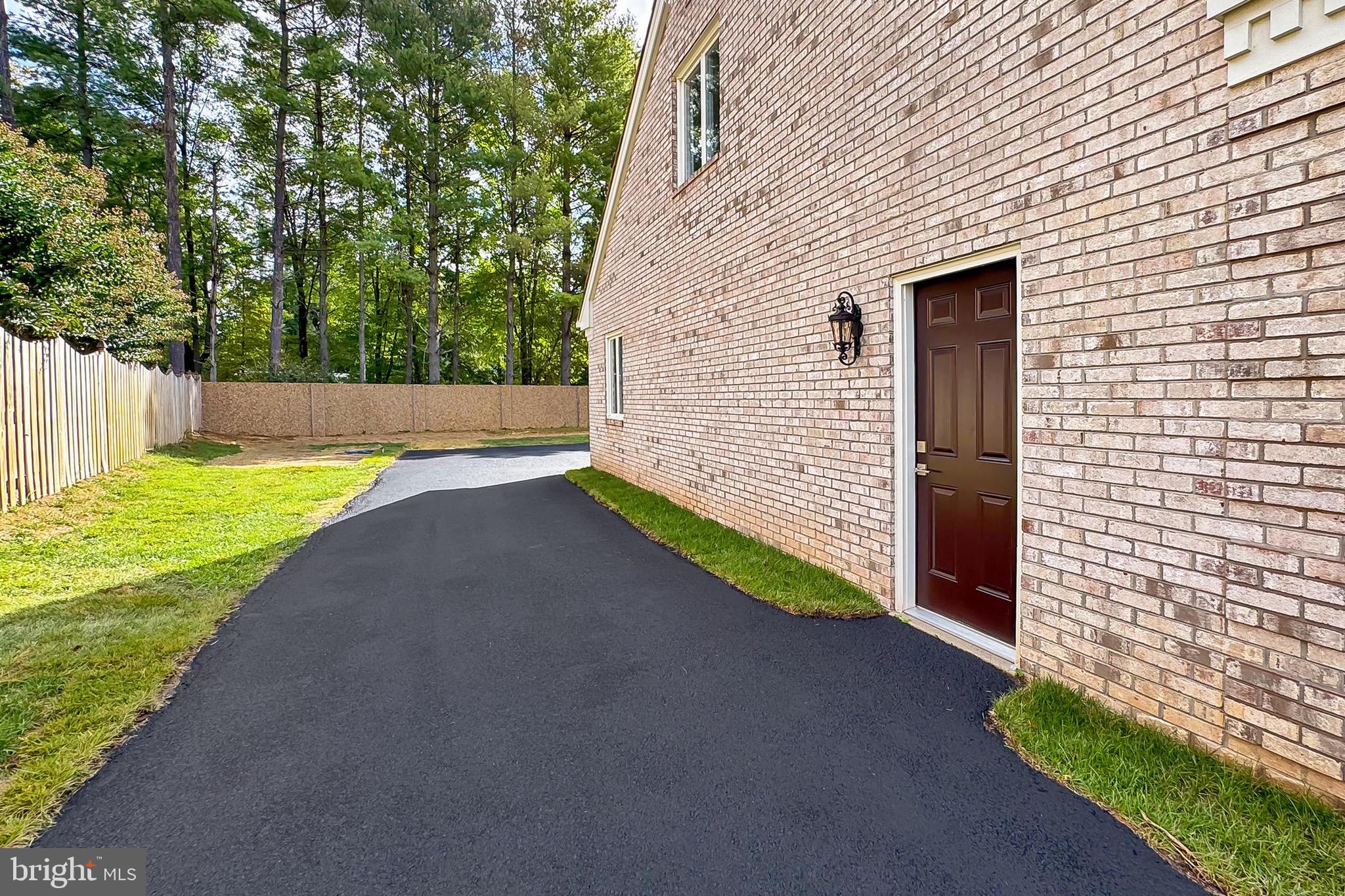 6294 Dunaway Court McLean, VA 22101 - Photo 74 of 76 a view of a backyard with large trees