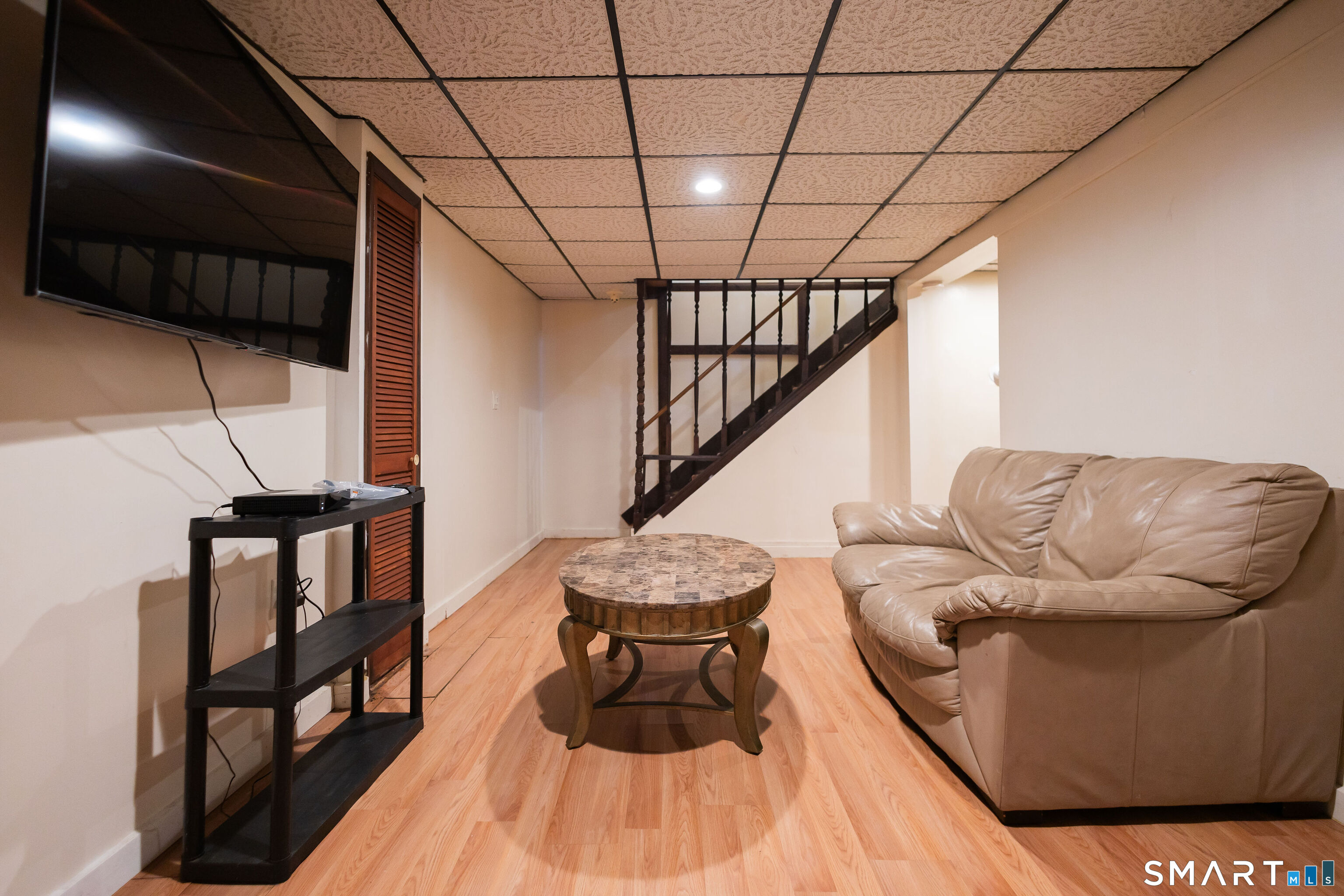 138 Infield Street Bridgeport, CT 06606 - Photo 27 of 34 a view of entryway and hall with wooden floor