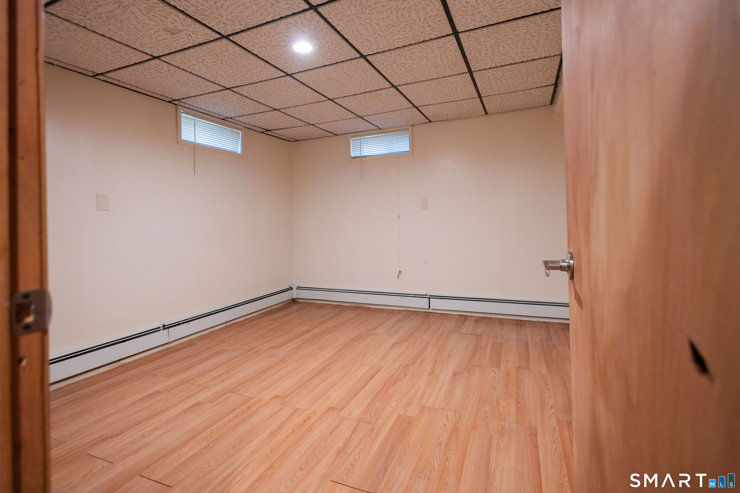 138 Infield Street Bridgeport, CT 06606 - Photo 28 of 34 a view of a room with wooden floor