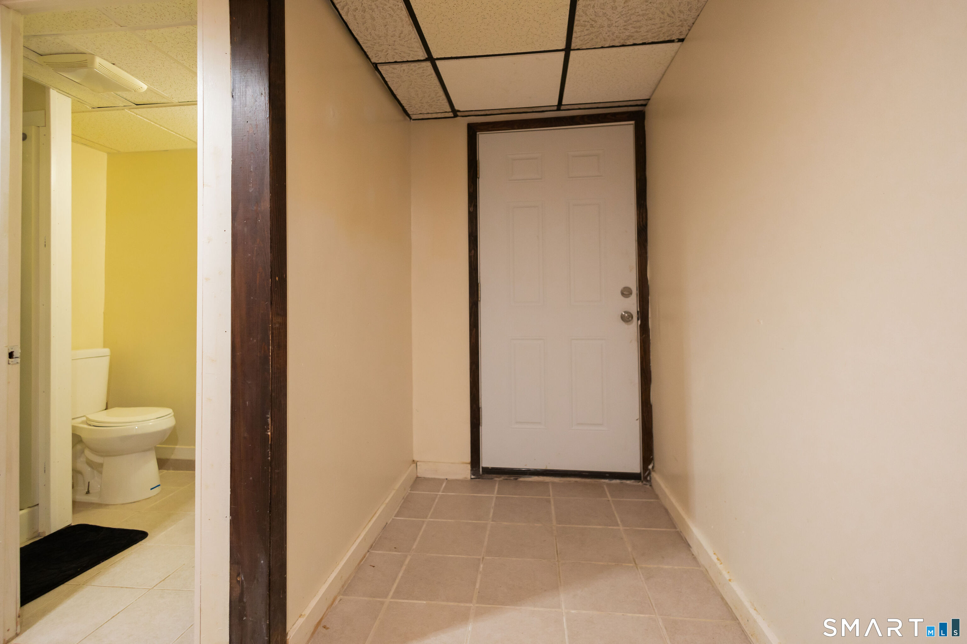 138 Infield Street Bridgeport, CT 06606 - Photo 29 of 34 a view of a bathroom with a glass door