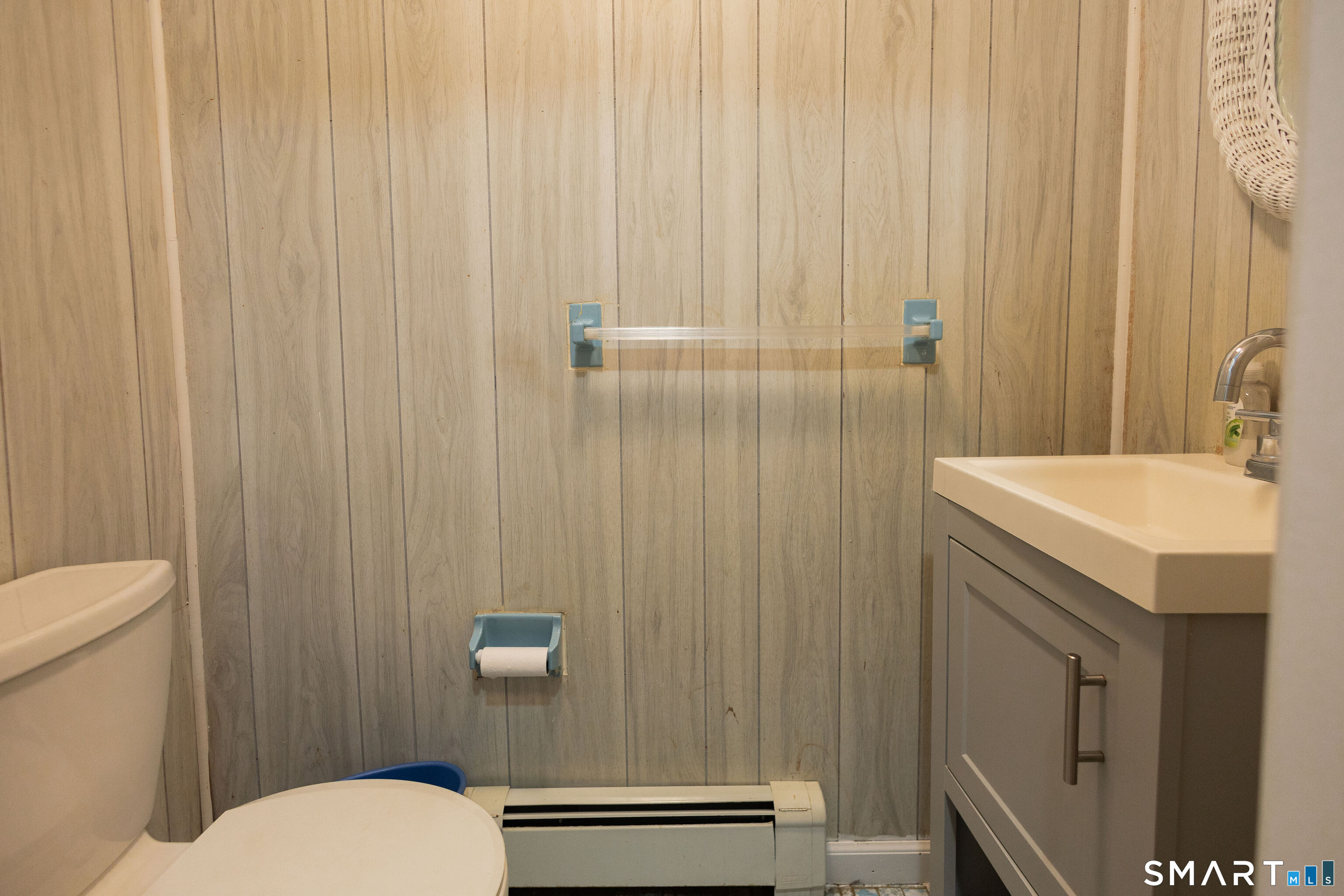 138 Infield Street Bridgeport, CT 06606 - Photo 7 of 34 a bathroom with a sink a toilet and shower