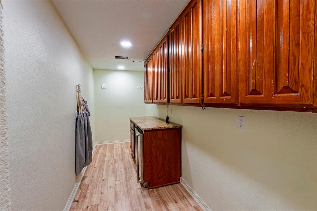2325 River Road Granbury, TX 76048 - Photo 22 of 40 Safe room and extra pantry space
