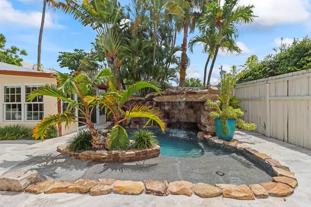 a utility room with sink dryer and washer
