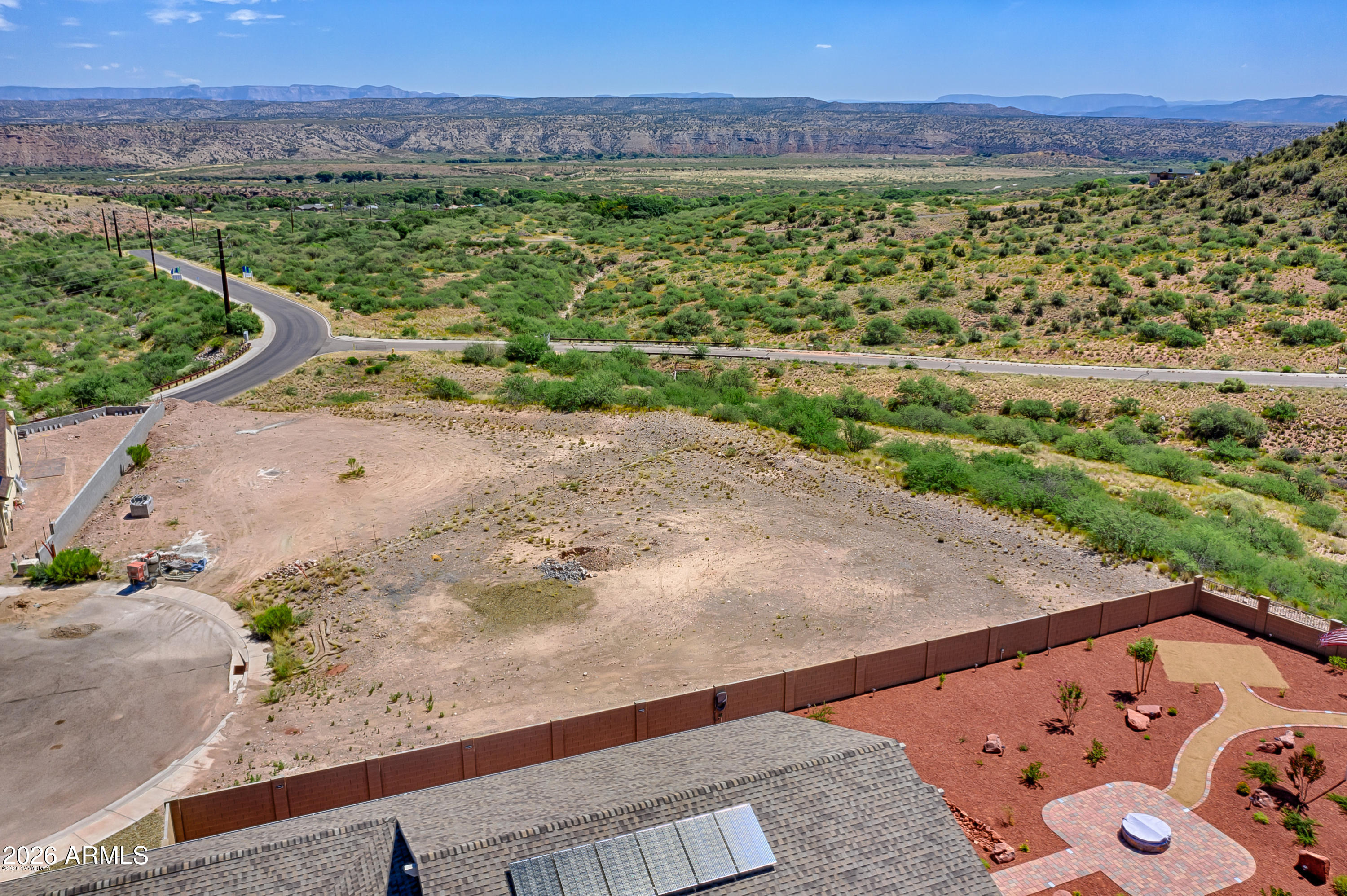 409 Powder Box Road, Unit 165 Clarkdale, AZ 86324 - Photo 5 of 10 a view of a yard with an outdoor space