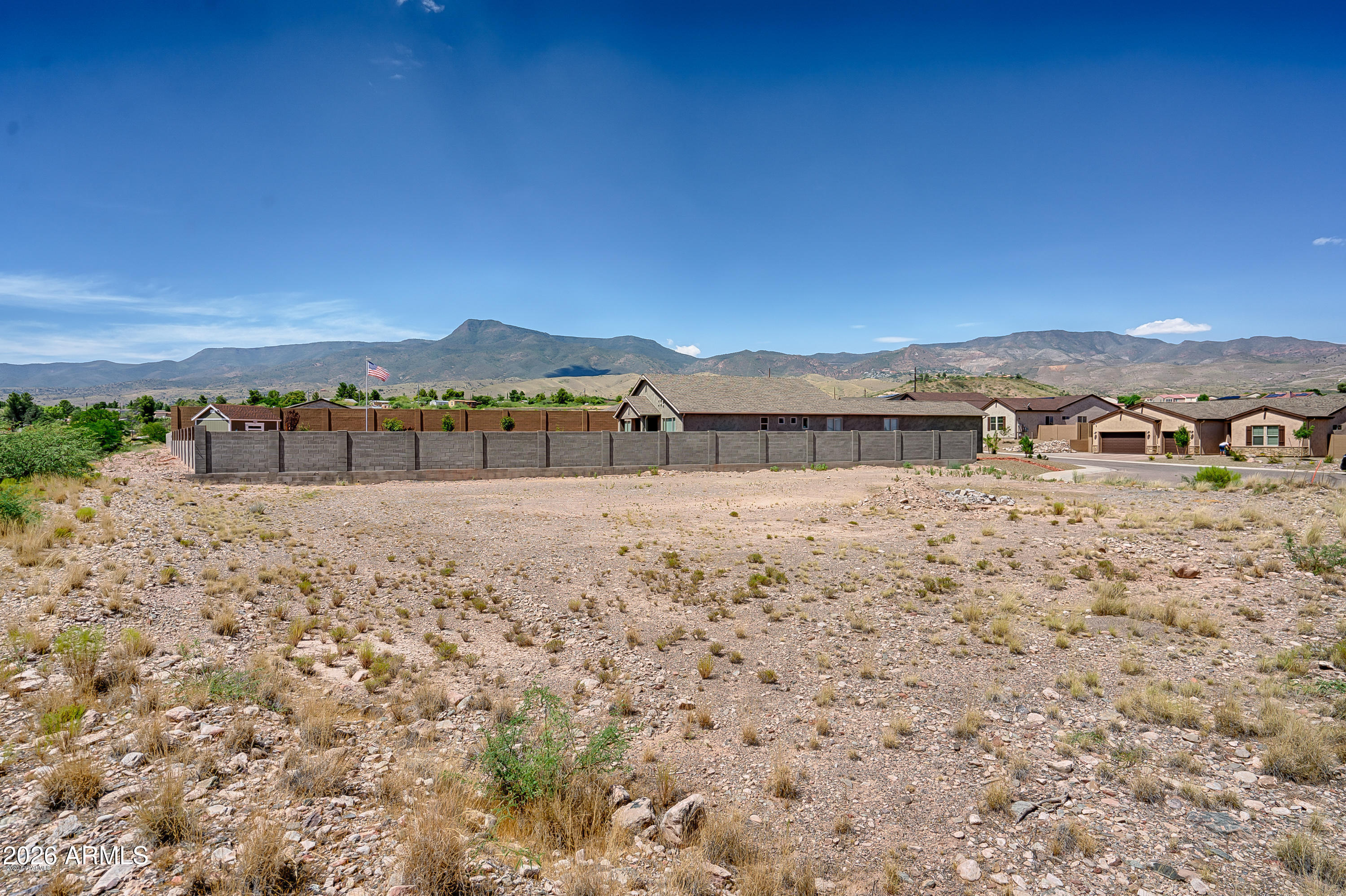 409 Powder Box Road, Unit 165 Clarkdale, AZ 86324 - Photo 7 of 10 a view of houses with a outdoor space