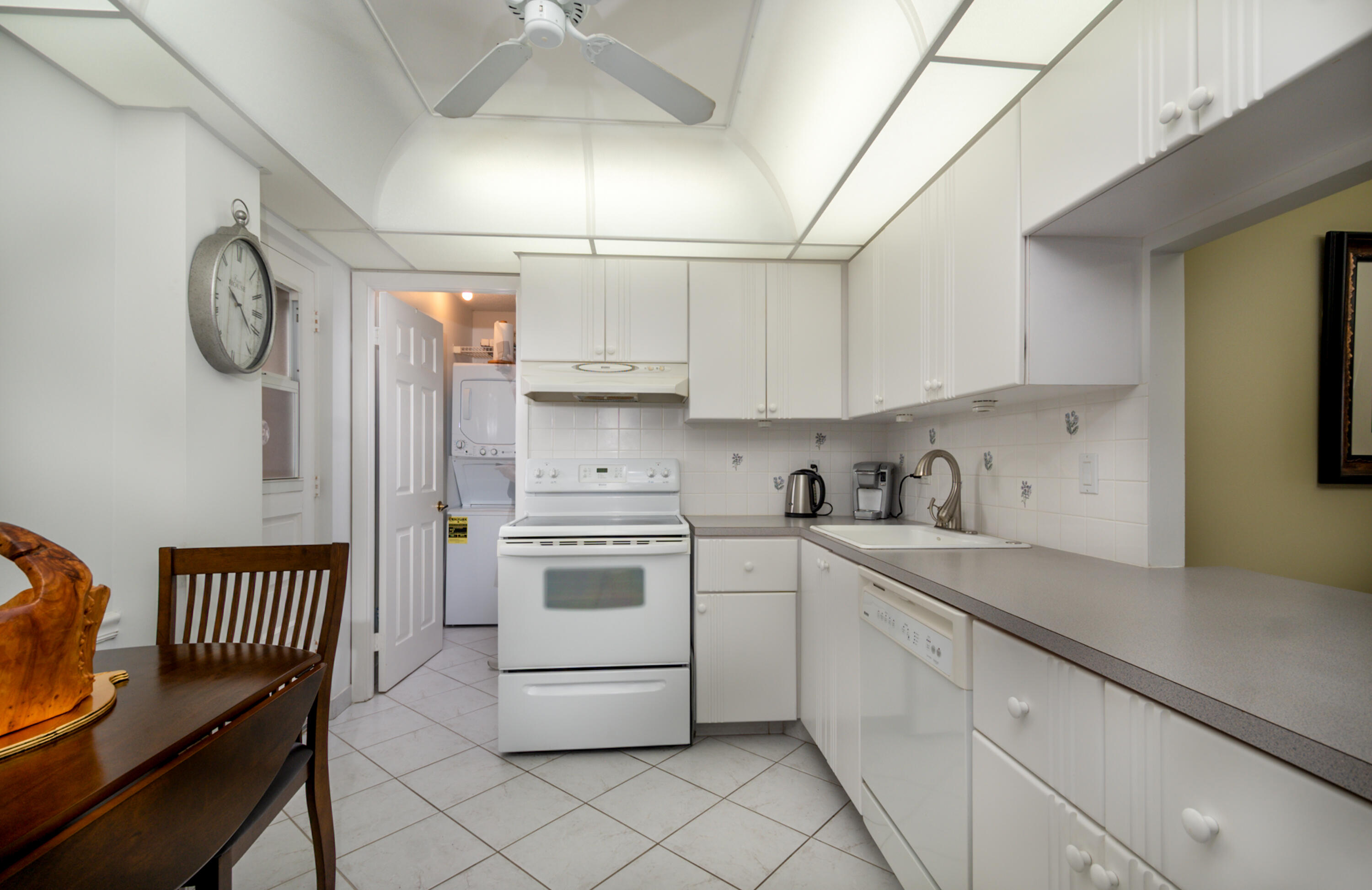 6461 Northwest 2nd Avenue, Unit 507 Boca Raton, FL 33487 - Photo 5 of 25 Kitchen - Laundry