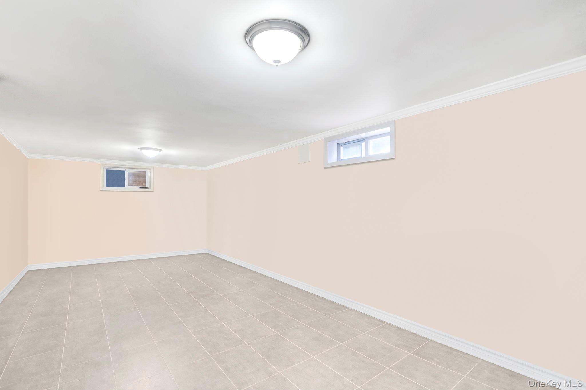 87-67 Chevy Chase Street Queens, NY 11432 - Photo 29 of 31 a view of an empty room