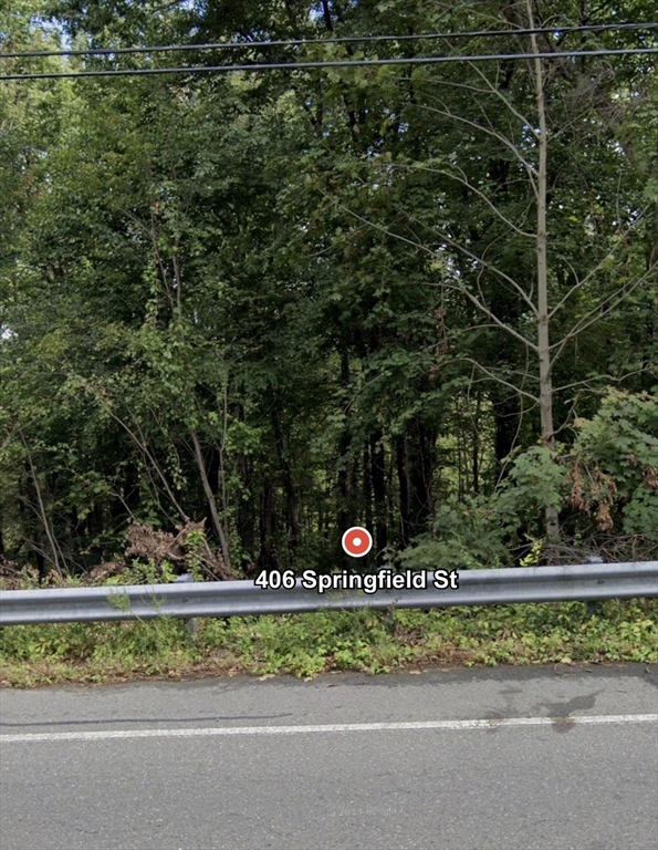 a view of a park with of a street