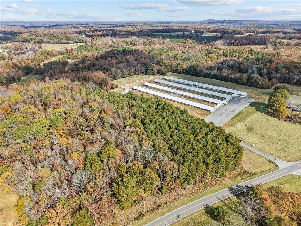 0 Timber Ridge Lake Road Liberty, NC 27298 - Photo 15 of 18 Aerial view of vacant land and farms. Lot lines and dimensions are approximate.