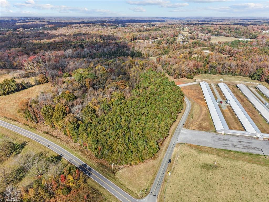 0 Timber Ridge Lake Road Liberty, NC 27298 - Photo 3 of 18 Aerial view of vacant land and farm land. Lot lines and dimensions are approximate.