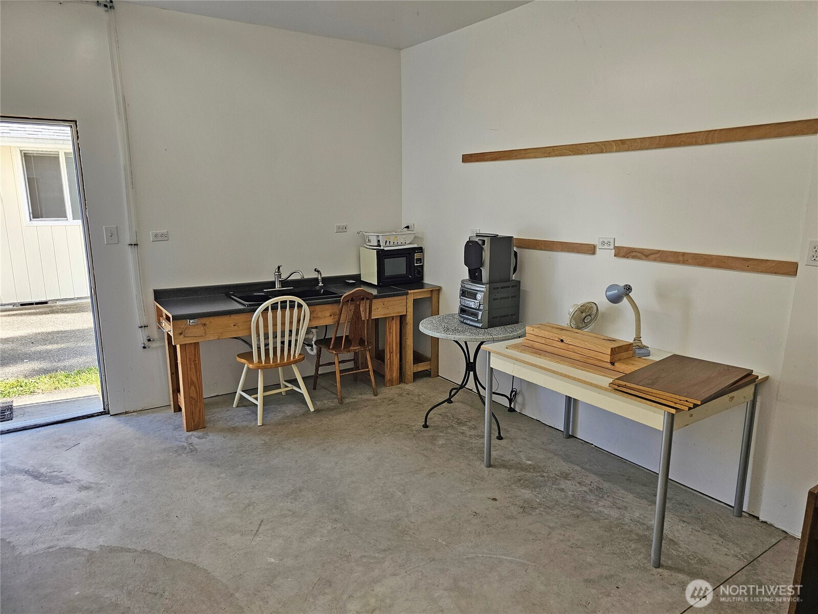 17103 Camas Run Lane Southwest Rochester, WA 98579 - Photo 23 of 40 a living room with furniture and a table
