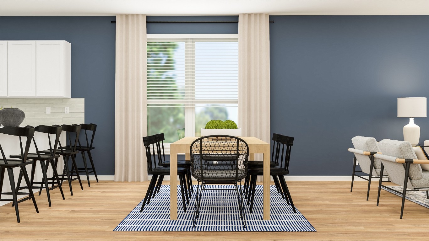 153 Sormonne Loop Kyle, TX 78640 - Photo 4 of 14 a dining room with furniture and wooden floor