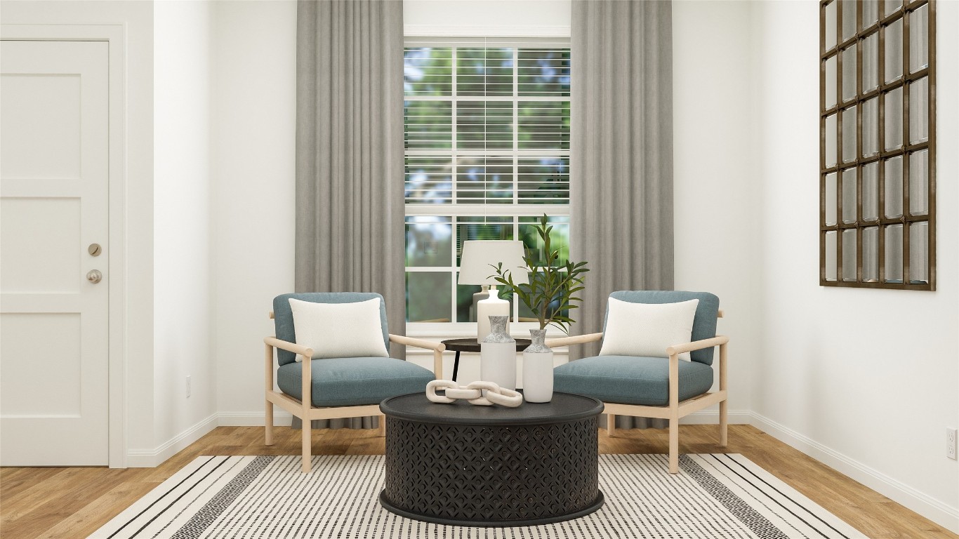 153 Sormonne Loop Kyle, TX 78640 - Photo 5 of 14 a dining room with furniture and wooden floor