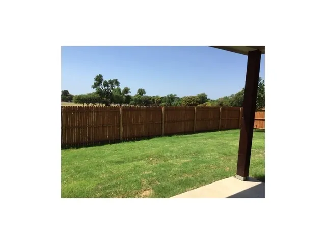 a picture of a person on a yard