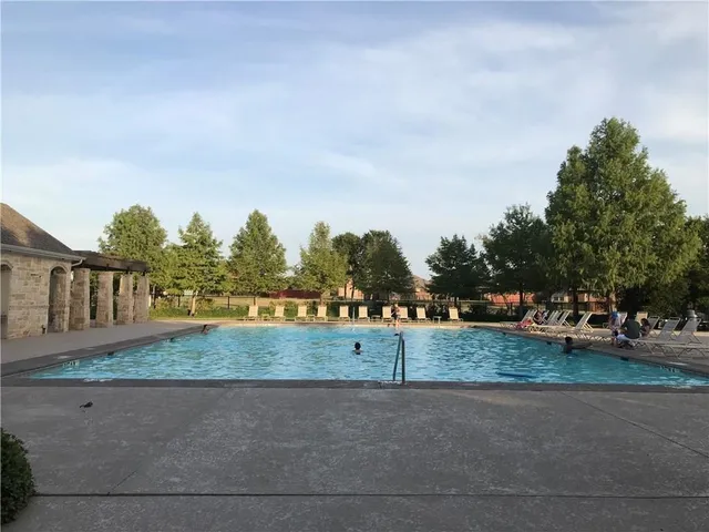 a view of a yard and mountain view
