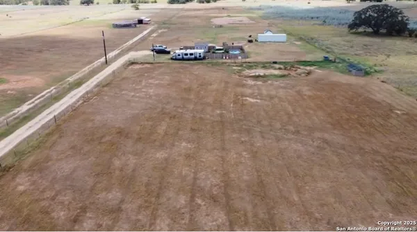 a view of a backyard of a house