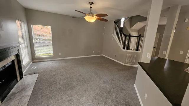 a view of a livingroom with a fireplace