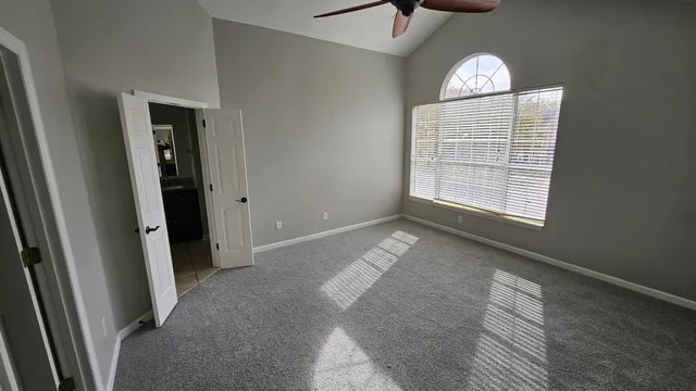 an empty room with windows