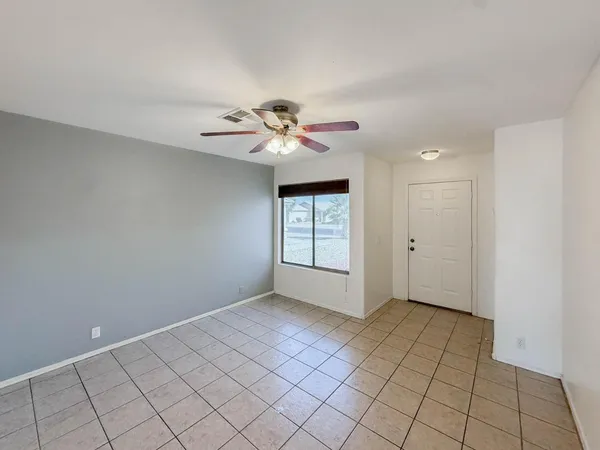 a view of an empty room and window