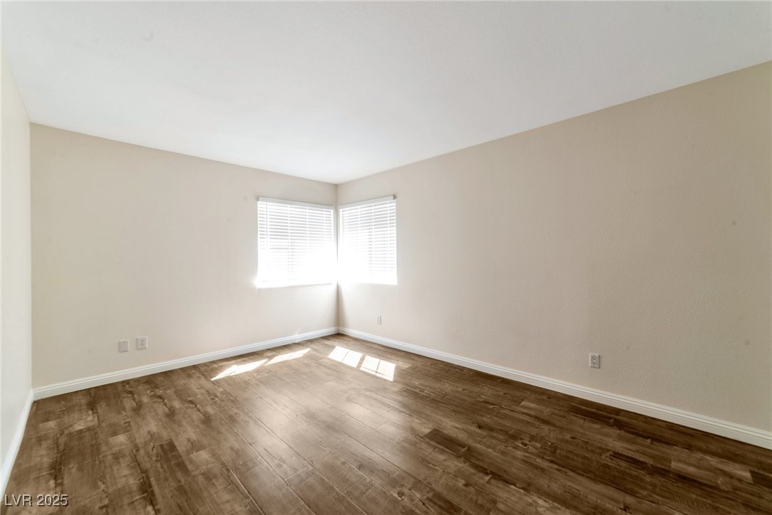 121 Golf Course Street Las Vegas, NV 89145 - Photo 13 of 15 Unfurnished room featuring dark wood-type flooring