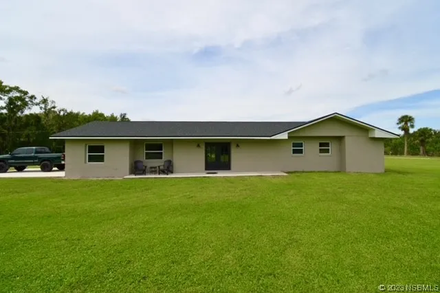 a house view with a outdoor space