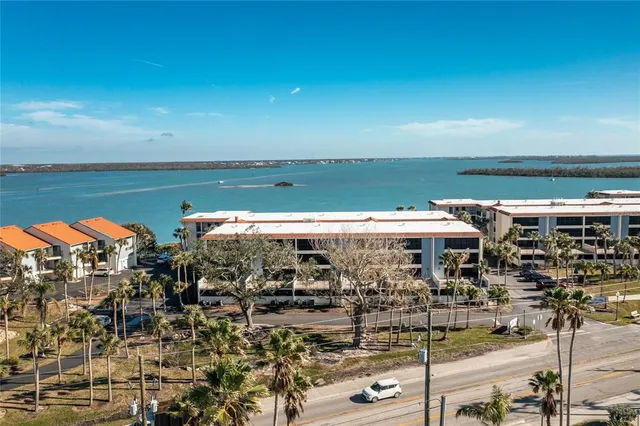 a view of a lake with a city