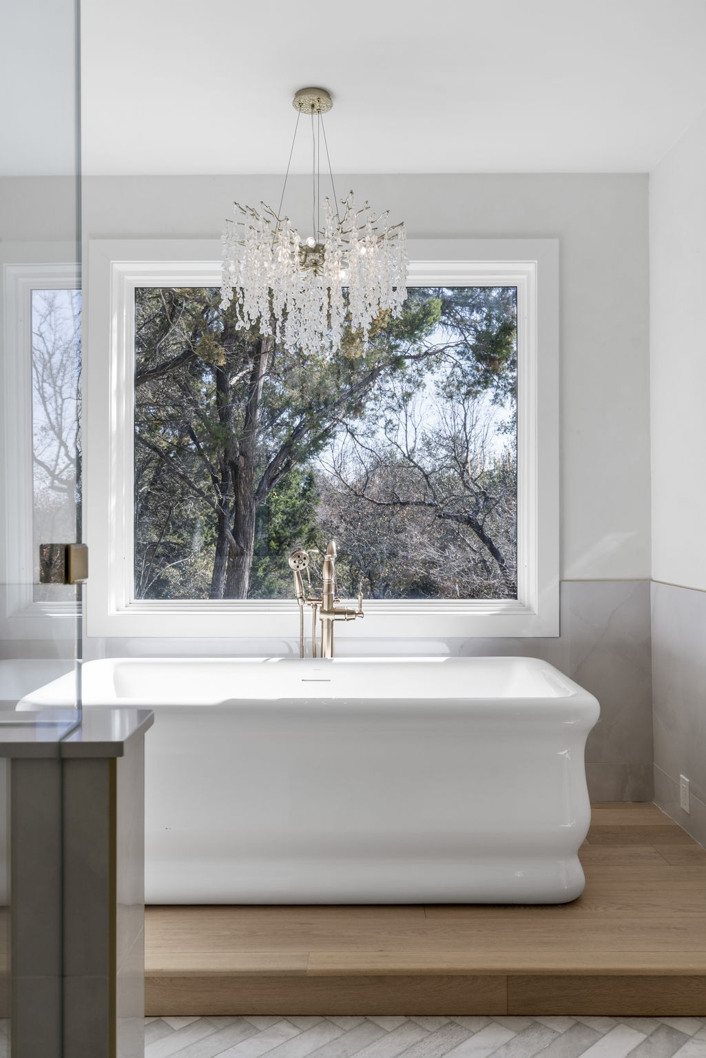 701 Furlong Drive Austin, TX 78746 - Photo 19 of 40 a view of a sink and a mirror