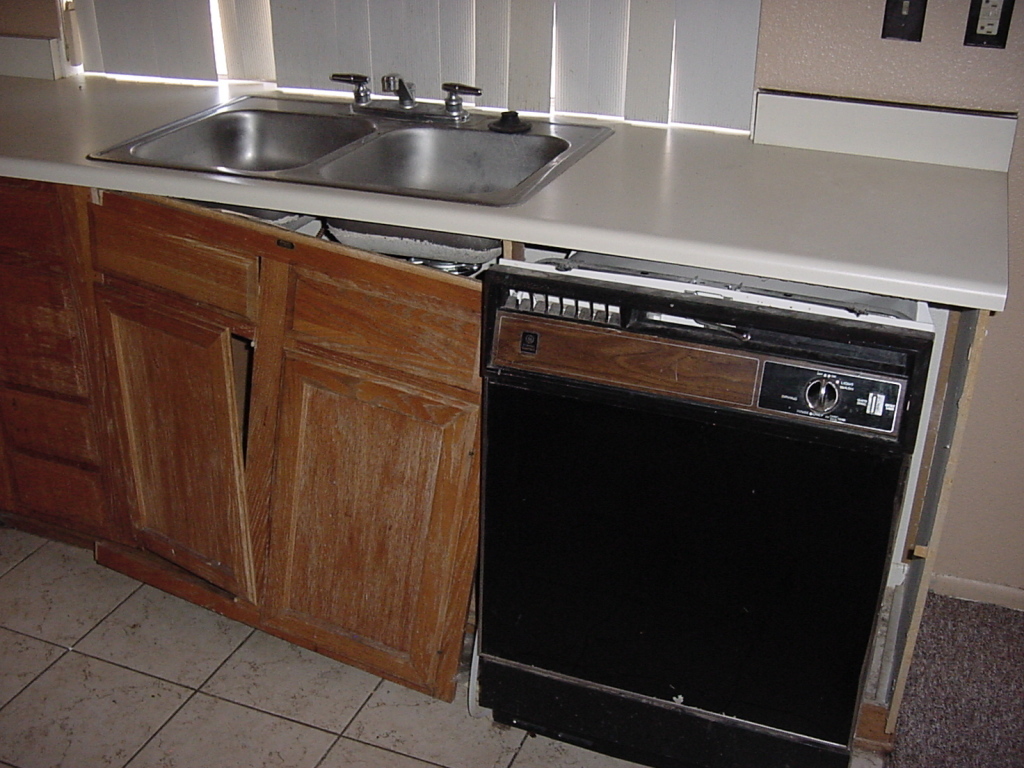 1705 East Carson Road Phoenix, AZ 85042 - Photo 6 of 20 Broken cabinet