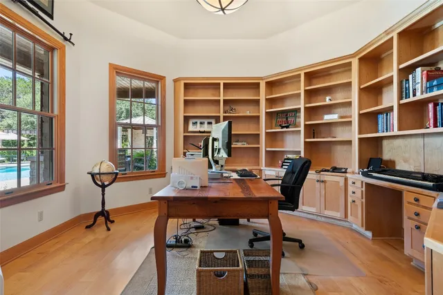 a living room with furniture ceiling fan and a rug