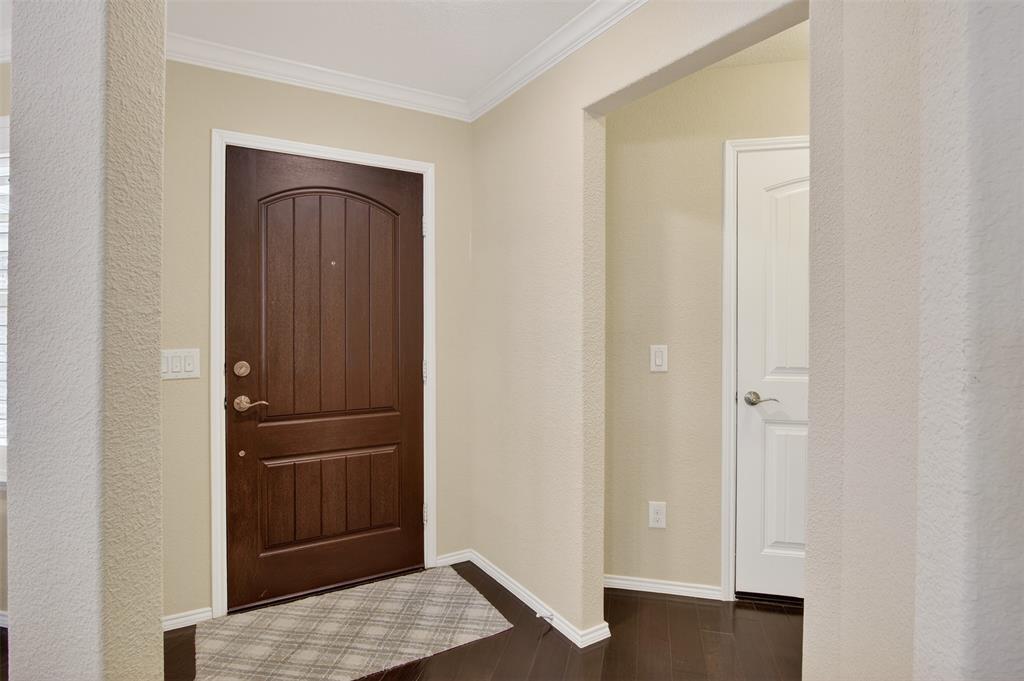 8978 Shore Crest Road Frisco, TX 75036 - Photo 4 of 40 a view of walk in closet with empty racks