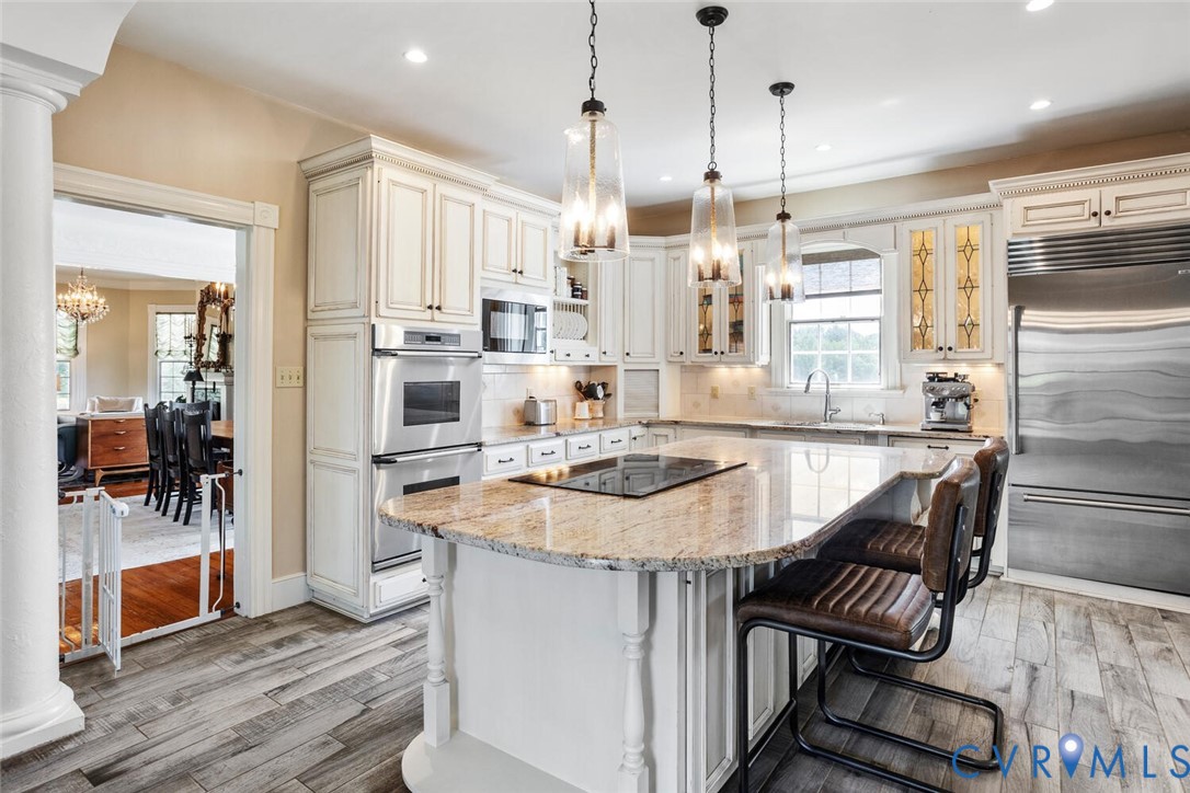 516 Mt Hermon Road Midlothian, VA 23112 - Photo 11 of 50 a kitchen with sink and refrigerator